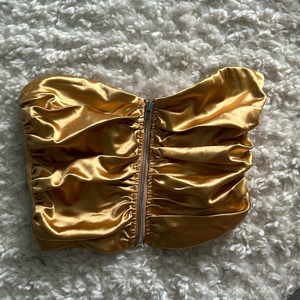 Metallic gold strapless tube top with silver zipper front